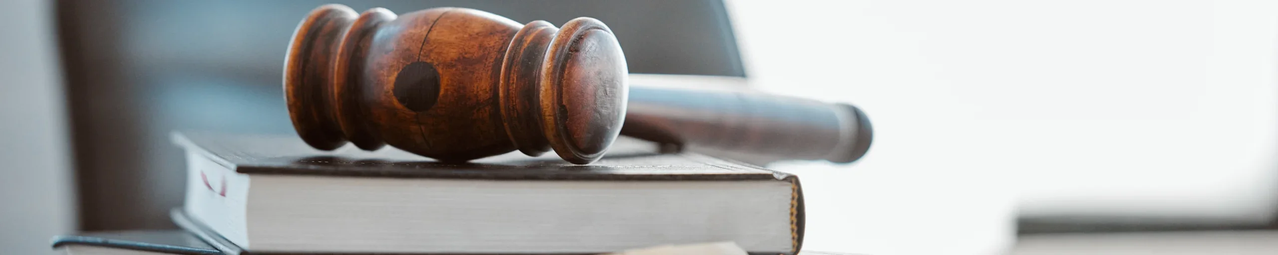 gavel on pile of books